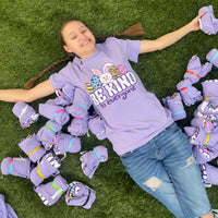 Jordyn, is egg-cited to model our new Easter Be Kind to Everyone® tee. She is wearing a small in this picture.