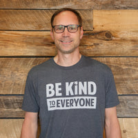 Ben, wearing a large in our "Hudson" Be Kind to Everyone® short-sleeve shirt.