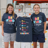 Jackie and Jordyn, at the shirt shop, displaying the back of our "T.E.A.C.H. Kindness" Be Kind to Everyone® short-sleeve tee. The are both wearing smalls.