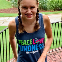Jordyn, modeling a small in our Peace, Love, and Kindness for Everyone® adult racerback tank top.