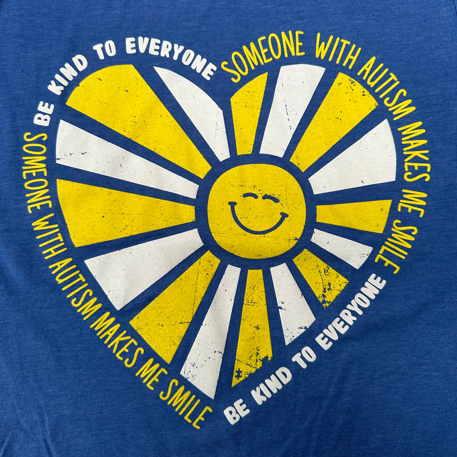 Our Someone with Autism Makes Me Smile Be Kind to Everyone® tee features a bright, cheerful design.