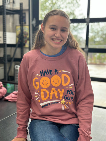 Our Have a Good Day Sweatshirt will help you spread smiles wherever you go.