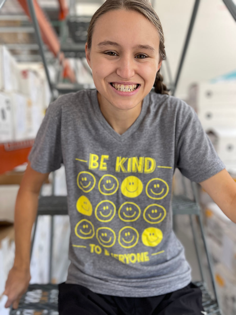 Jordyn, modeling a small, in our All Smiles Be Kind to Everyone V-Neck.