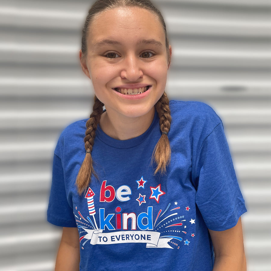 Jordyn, modeling a small in our adult 4th of July Be Kind to Everyone® short-sleeved t-shirt.