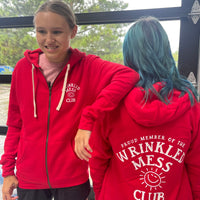 Our New Wrinkled Mess Club Hoodie in bright red.