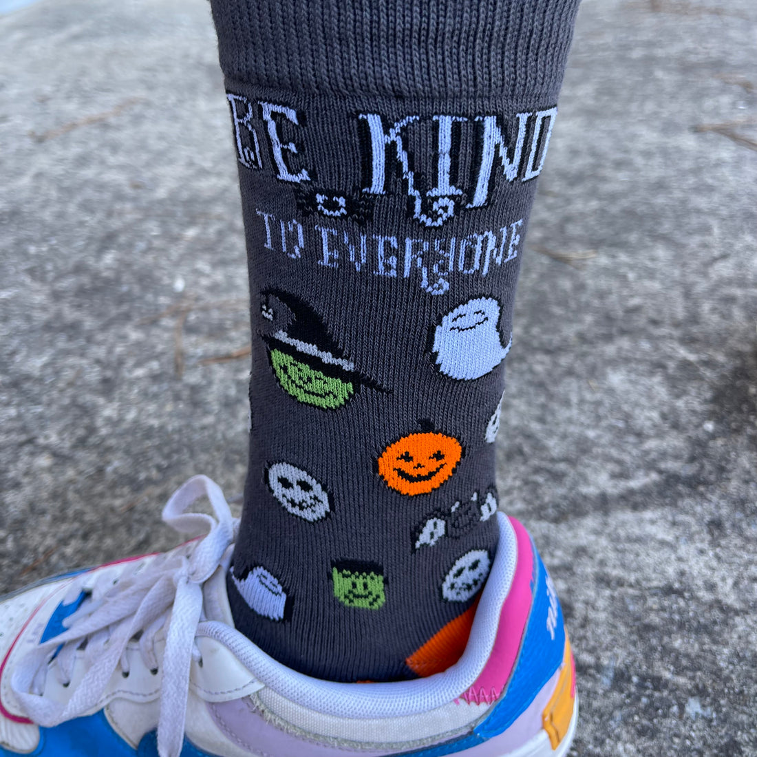 Jordyn, wearing our fa-BOO-lous new Halloween Be Kind to Everyone® socks.