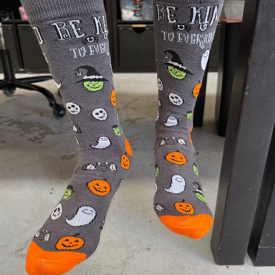 Our Halloween Be Kind to Everyone® Socks look hex-tra spooktacular when paired with our new Halloween tee.