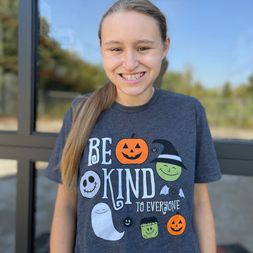 Jordyn, modeling a small in our spooktacular Halloween Be Kind to Everyone®t-shirt.