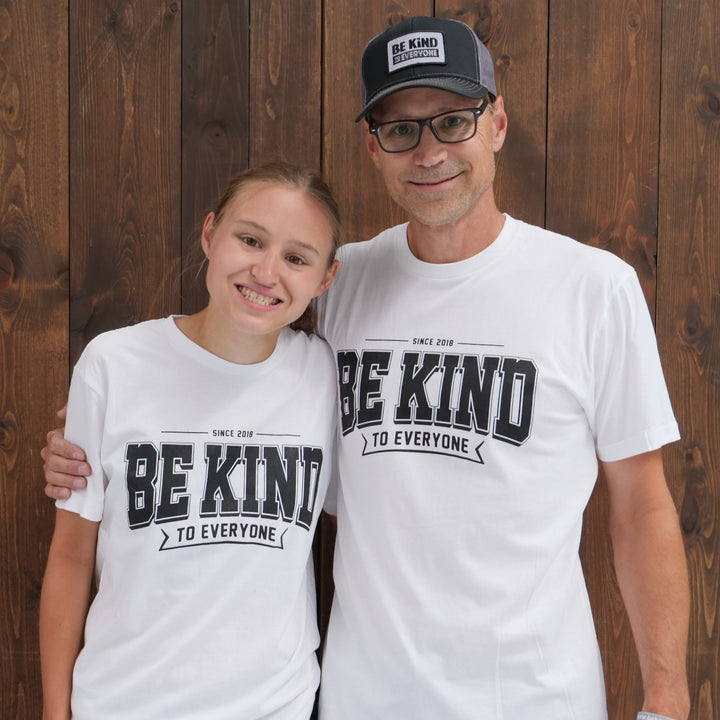 Jordyn and Ben, modeling our new "Ben" Be Kind to Everyone short-sleeved t-shirt.  Jordyn is wearing a small; Ben is wearing a large.