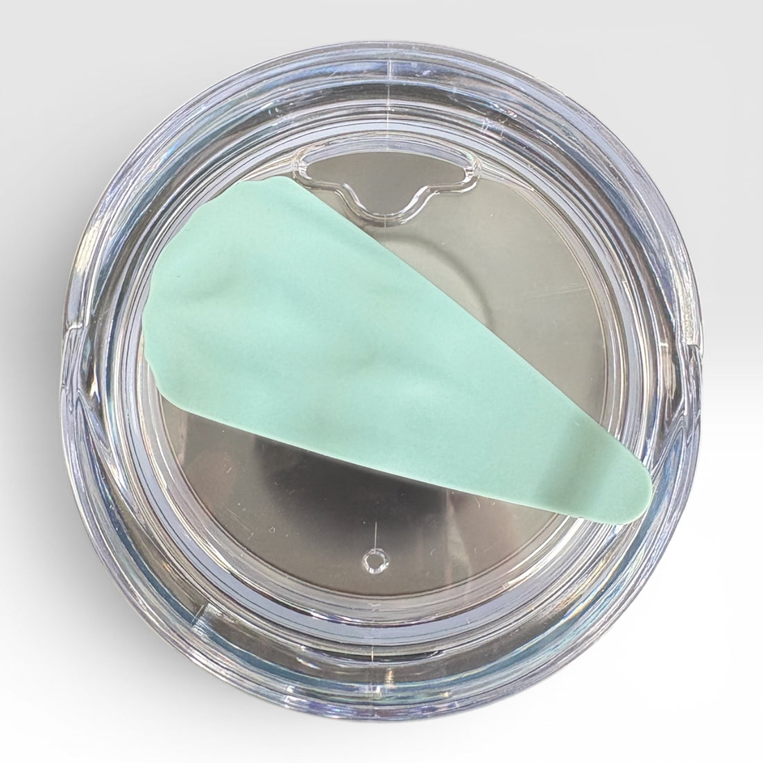 The lid of our Nope Not Today seafoam tumbler against a white background.