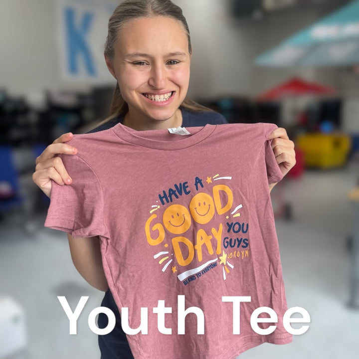 Jordyn, displaying our new YOUTH Have a Good Day You Guys - Be Kind to Everyone® short-sleeved tee in mauve.