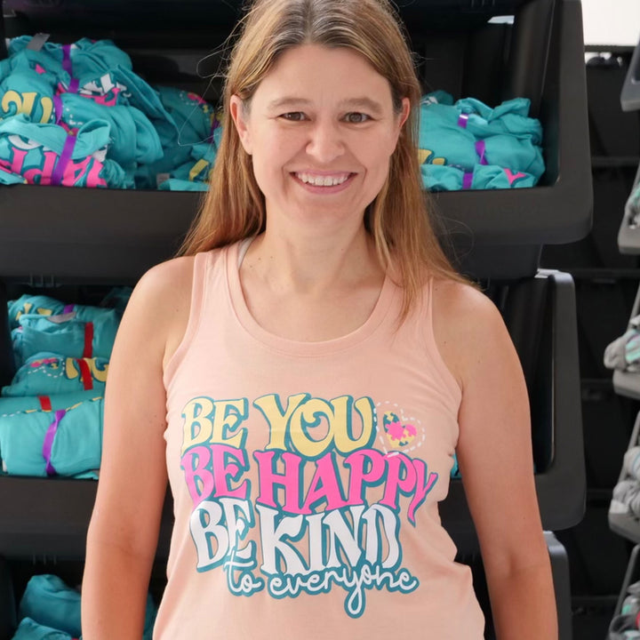 Jackie, modeling a small in our peach Be You, Be Happy, Be Kind to Everyone® tank top.