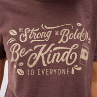 Close-up image of our our short-sleeve "Coffee" Be Kind to Everyone® shirt.