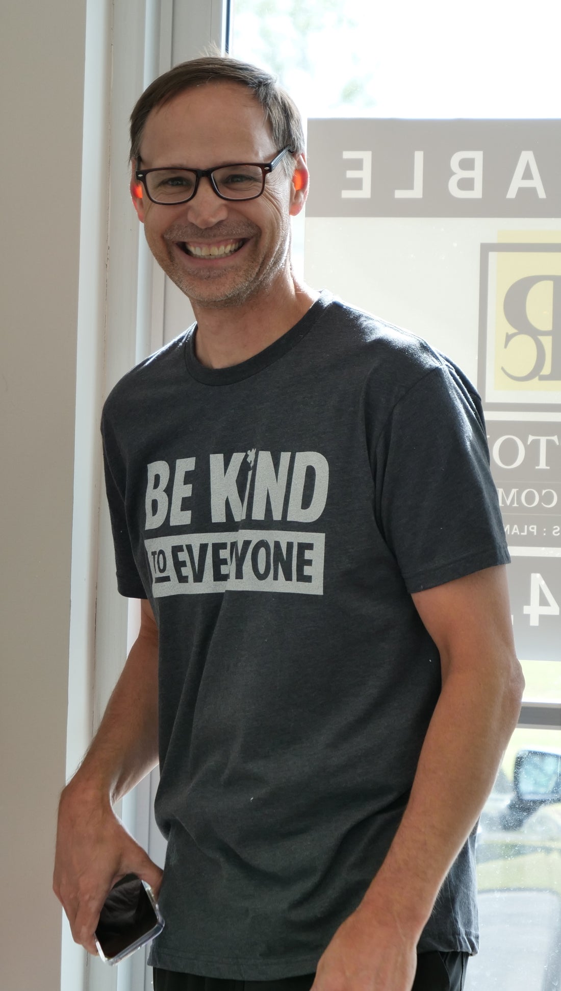 Ben, wearing a large in our "Hudson" Be Kind to Everyone® short-sleeve shirt.