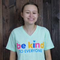 Jordyn, wearing a small in our mint Be Kind to Everyone® v-neck t-shirt.