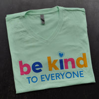 Close up of our mint Be Kind to Everyone® v-neck t-shirt.
