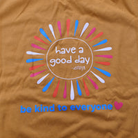 Close up image of our YOUTH Sunshine Be Kind to Everyone® short-sleeved tee.