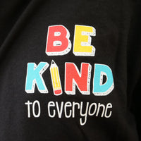 Close up image of the front of our T.E.A.C.H. Kindness Be Kind to Everyone® zip-up hoodies.