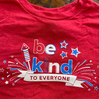 Close up image of our youth 4th of July Be Kind to Everyone® short sleeve shirt.
