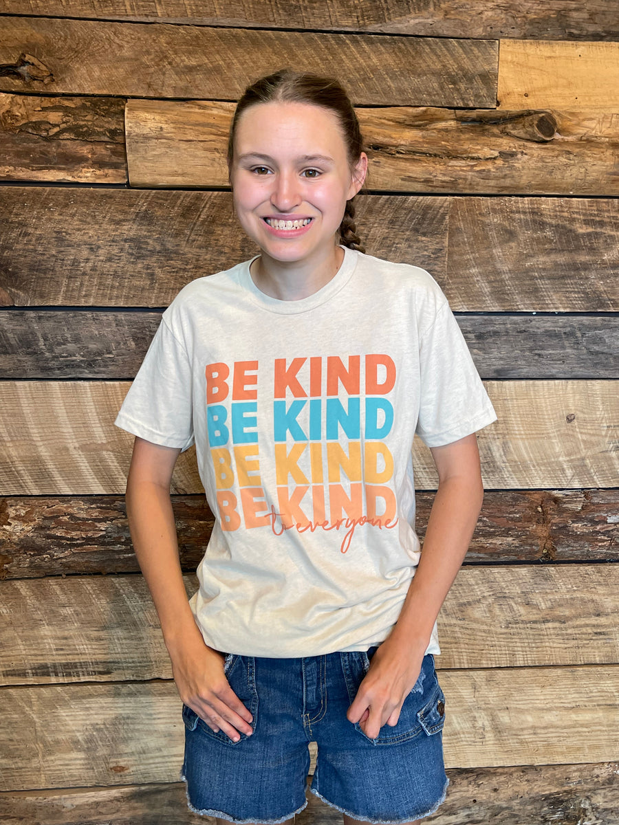 Jordyn, wearing a small in our "Repeating Kindness" Be Kind to Everyone® short-sleeve tee.