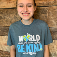Jordyn wearing our In a World Where You Can Be Anything, Be Kind to Everyone®, short-sleeve tee in a small.