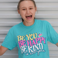 Jordyn, goofing around in her Be You, Be Happy, Be Kind to Everyone® short-sleeve shirt.