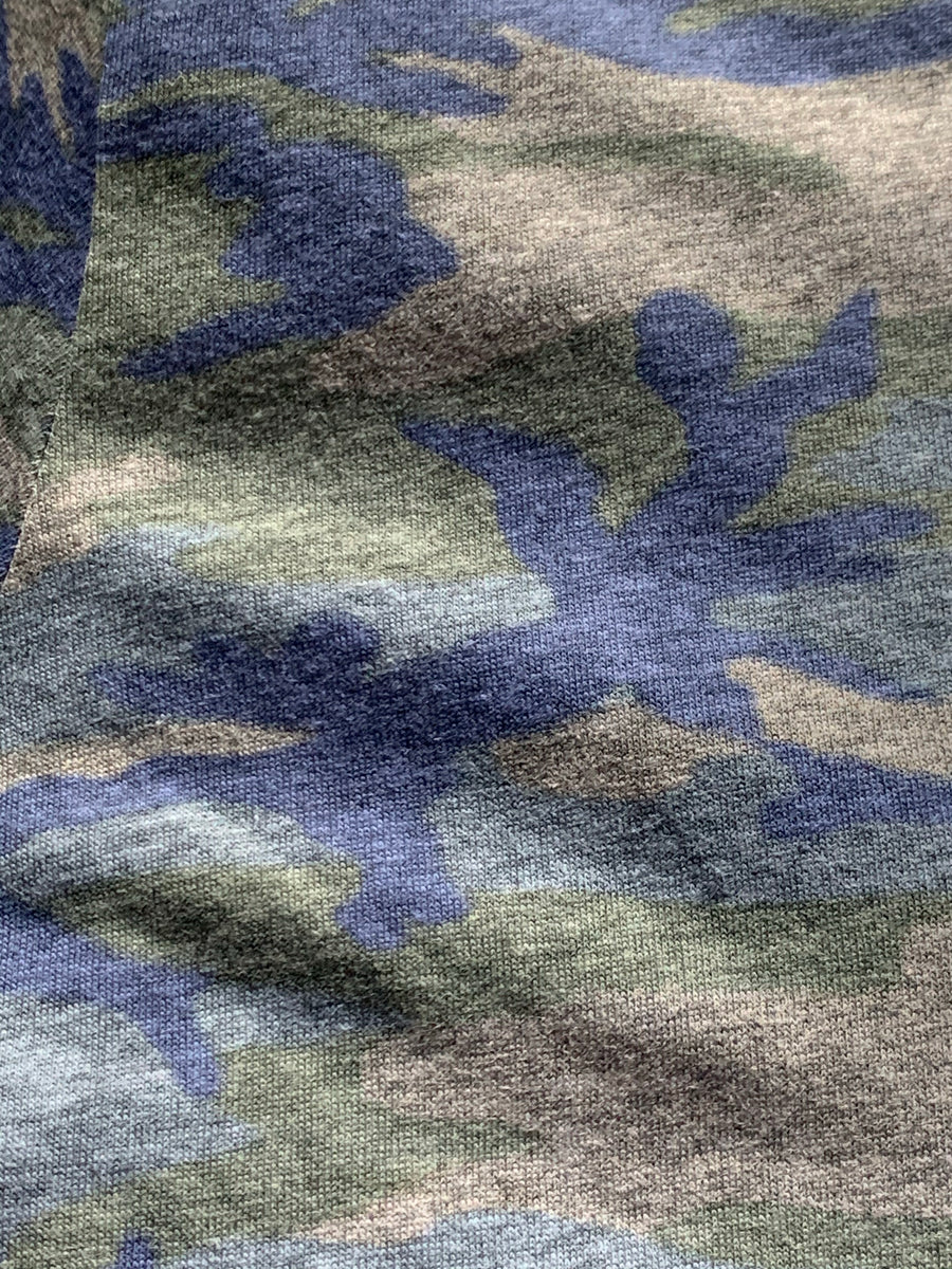 Close-up image of the fabric in our Camo Hudson Be Kind to Everyone® short-sleeved t-shirt for youth.