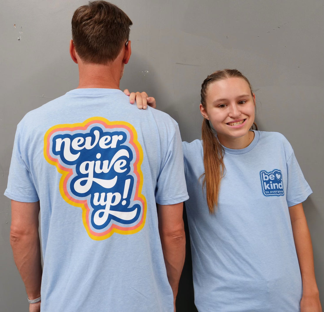 "Never Give Up" Be Kind to Everyone® short-sleeve tee