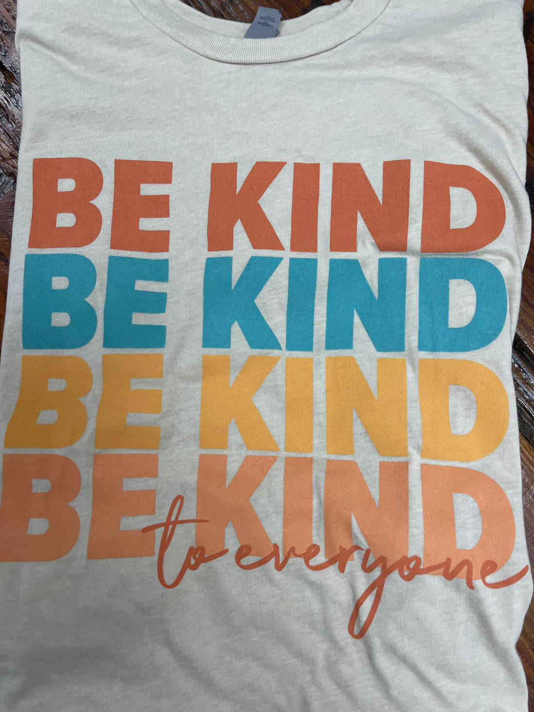 Close-up image of our "Repeating Kindness" Be Kind to Everyone® short-sleeve tee.